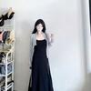 Vestido francés negro de tirantes para mujer en verano con temperamento de pequeña vacación junto al mar, falda larga adelgazante