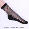 Medias de cristal al por mayor para niños rosa dulce antideslizantes con base de algodón transparentes de tubo medio para mujer calcetines de algodón de caña baja de moda