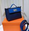 Retro Europeo y Americano Piel de Vaca de Primera Capa 2424 Bolso Kelly Mini Bolso Dumpling de Cuero Genuino Bolso de Hombro de Moda Bolso Cruzado Bolso de Mujer
