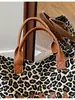 Bolso de mano con estampado de leopardo estilo perezoso de verano 2026, versión coreana, gran capacidad, con cremallera, tipo tote, para ir al trabajo, bolso de hombro