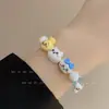 Livro Chapeuzinho Vermelho com Pulseira de Gatinho KT Desenho Fofo Cor da Moda Miçangas Tecido à Mão Cordão Doce