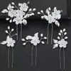 Acessórios de cabelo de noiva mais vendidos transfronteiriços, tiara de flor de pérola, pente de cabelo feito à mão, conjunto de grampos e palitos de cabelo para fotografia de viagem de casamento