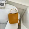 Bolsa Saco Textura Tecida para o Dia a Dia 2026 Verão Nova Moda Ombro Único Transversal Tendência Cor Sólida Bolsa de Mão Personalizada