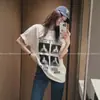 Camiseta de manga curta de algodão puro com estampa de cachorro de desenho animado estilo europeu para mulheres 2026 verão plus size solta modeladora top moderno