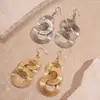 Pendientes de Gancho Redondos Geométricos Huecos Europeos y Americanos con Borlas Enroscadas, Tacto Metálico, Exagerados, de Nicho, Únicos y de Alta Gama