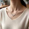 Cadena de plata para clavícula con espiga de trigo cruzada europea y americana para mujer, collar con colgante de lujo ligero de nicho con incrustaciones de diamantes, versátil para ir al trabajo, estilo nuevo