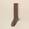 Calcetines de mujer otoño e invierno gruesos más terciopelo calcetines hasta la pantorrilla presión pierna delgada toalla cálido negro medias de invierno marea