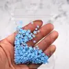Arte de uñas flor de cinco pétalos joyería flor blanca pequeña bolsa mixta de tamaño de cuentas doradas y plateadas decoración de pegatina de uña de flor de resina venta al por mayor