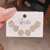 2025 Nuevo Estilo Caliente Exquisitos Pendientes Pequeños de Flor y Circonita Set de Tres Pares Estilo de Lujo Accesible para Mujer Set de Seis Pares de Pendientes