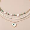 NZ2881 Colgante de amor transfronterizo europeo y americano con costuras turquesas, collar de perlas para mujer, collar apilado de nicho retro, marea