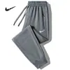 Pantalones de chándal holgados de pierna recta para hombre, talla grande, para primavera y otoño, joggers modernos con bolsillo y cremallera, pantalones casuales elegantes para hombre
