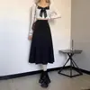 Saia Preta de Inverno/Outono 2026 Estilo Novo Francês Comprimento Médio Cintura Alta Emagrecedora Linha A para Meninas Baixas Saia Evasê Grande Guarda-Chuva