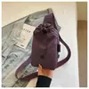 Bolsa de pecho ligera con cordón modelo nuevo verano 2026 bolsa cruzada compacta multifuncional para mujer bolsa versátil para teléfono bolsa de tela de un solo hombro