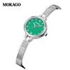 Reloj de pulsera estilo brazalete Moka de alta gama, alto valor estético, incrustado de diamantes, resistente al agua, elegante, reloj redondo compacto, simple reloj de pulsera de cuarzo para mujer