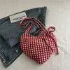 Bolsa Xadrez Relaxante de Grande Capacidade Feminina 2025 Nova Bolsa de Ombro para o Trabalho Outono e Inverno Bolsa Tote para Estudante Universitário
