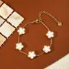 Pulsera de Trébol de Cinco Hojas Doble Cara Versión Alta Transfronteriza Dopamina Lujo Ligero Simple Sentido Avanzado 18k No Se Descolora Lanzamiento