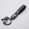 Llavero popular transfronterizo con logo de coche, colgante de alta gama con logo de coche, accesorios de llavero para motocicletas y vehículos eléctricos