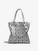 Bolso de mujer nuevo estilo japonés y coreano para primavera/verano, moderno, simple, deslumbrante, de alta gama, patrón de rombos geométricos, versátil, bolso de hombro de gran capacidad