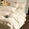 Novo conjunto de quatro peças de algodão 100% puro de alta qualidade, simples e luxuoso, feito de algodão de fibra longa com bordado, conjunto de quatro peças estilo lençol com elástico