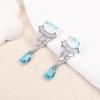 Elegantes aretes de gota de agua para mujer aguja de plata s925 lujo ligero diseño único aretes de alto sentido ventas directas de fábrica de joyería de Yiwu