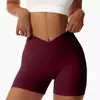 Shorts de ioga europeus e americanos ao ar livre elástico cintura alta correndo fitness apertado pêssego quadril sem costura calções esportivos para as mulheres