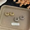Brincos de metal espiral torcido de moda europeia e americana para mulheres, brincos únicos e de luxo leve de alta qualidade