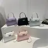 Bolso bandolera con una textura de moda y diseño sencillo, diseño de nicho para el verano 2026, bolso de hombro casual, nuevo bolso cuadrado pequeño para mujer