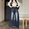 Foto real de jeans de pierna ancha lavados con pliegues estilo retro americano para mujer, nuevos pantalones versátiles de otoño de cintura alta rectos adelgazantes