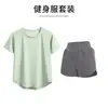 Conjunto de Fitness de Verano Sencillo Color Sólido Top de Manga Corta Shorts Anti-exposición Transpirable Adelgazante Running Deportes Conjunto de Dos Piezas
