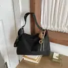 Bolsa Feminina Versátil Nova de Inverno 2026 Popular Fosca de Nicho Bolsa de Ombro Bolsa Transversal Bolsa de Ombro Único
