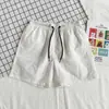 Populares shorts casuales de verano para hombre de comercio exterior transfronterizo, shorts de cinco puntos de colores caramelo, shorts de playa impermeables de secado rápido en diez colores para hombre
