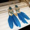 Pendientes bohemios con forma de gota de agua, hojas y plumas, estilo étnico retro, elegantes y de alta gama para mujer.