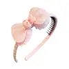 Diadema de tela con diseño de conejito de dibujos animados y flor, con dientes, antideslizante, adecuada para niños, versátil, no daña el cabello, accesorio para el cabello