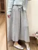 Outono/Inverno 2026 Novo Estilo Coreano Ins Casual Versátil para o Trabalho Emagrecedor Cintura Alta Comprimento Médio Saia de Tricô para Mulheres
