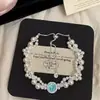 Pulseira Elegante e Refrescante Azul Marinho em Forma de Ovo com Pingentes de Pérola, Exquisita, Luxo Leve, Elegante, Delicada, Versátil para o Dia a Dia