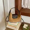Bolso de media luna minimalista de moda transfronterizo, bolso redondo pequeño versátil elegante de alta gama, bolso cruzado tipo dumpling moderno personalizado de lujo ligero