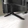Base de Televisión de Plástico Negro de Fábrica de 24 32 40 43 Pulgadas con Tornillos de Base Empaquetada Individualmente