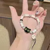 Pulseira de Corda Trançada Gato Caveira Mais Vendida para Mulheres Design de Nicho Sentido Doce Cool Estilo Chinês Pingentes Pulseira Colorida com Contas Joia de Mão