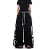 Pantalones de chándal retro americano de calle con estampado de letras en la cintura, paneles, dobladillo curvo, para hombre y mujer, casual deportivo de pierna ancha para primavera y otoño