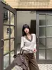Conjunto de Dos Piezas de Punto con Cuello en V Profundo para Mujer Yuyi Nuevo Otoño e Invierno 2025 de Punto con Mangas Largas y Cuello Halter Empalmado para Mujer Cm1427