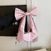 Moda Transfronteriza Estilo Chica Caliente Americana Bolso de Motocicleta de Moda con Remaches Diseño de Nicho Dulce y Fresco Bolso de Hombro Personalizado con Lazo
