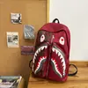 2026 Nuevo Modelo Mochila de Gran Capacidad Única Peculiar Tendencia Fresca Fea-Linda Personalidad Mochila Versátil Mochila de Viaje Casual