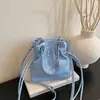 Bolso bandolera de moda con cordón, color liso, para mujer, nueva colección de primavera 2026, bolso de hombro simple y elegante en forma de cubo
