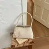 Bolso tejido de nicho estilo francés Ruien para mujer, nuevo bolso de hombro vintage de moda para commuting otoño 2026