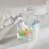Garrafa de areia movediça de celebridade da internet criativa com contas coloridas em um pingente de garrafa de óleo acrílico chaveiro pingente bolsa pequenos acessórios atacado