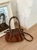 2026 Verano Nuevo Estilo Coreano Diseño de Nicho Bolso de Hombro Simple Fruncido para Mujer Bolso de Axila Moda Diaria para el Trabajo