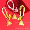 Chaveiro Criativo Zongzi HelloKitty Desenho Animado Fofo Gato KT Zongzi Pingente Dourado Festival do Barco-Dragão Presente Venda por Atacado