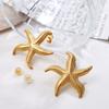 Pendientes explosivos de la serie Ocean 2025, con diseño de estrella de mar de estilo europeo y americano, exagerados y versátiles, de verano para mujer.