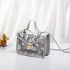Bolso Nuevo Estilo Coreano para Mujer Estampado de Margarita Hombro Gelatina Madre e Hijo Transparente Cuadrado Pequeño Bolso Cruzado Verano y Otoño 2023