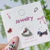Nuevos Aretes de Dibujos Animados de Kt Oreja de Gato Hueso Uñas Lindos Goteo de Aceite Kawaii Aretes Acero de Titanio Modernos Elegantes